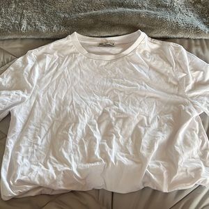 Zara white t shirt that’s cuffed at the waste.